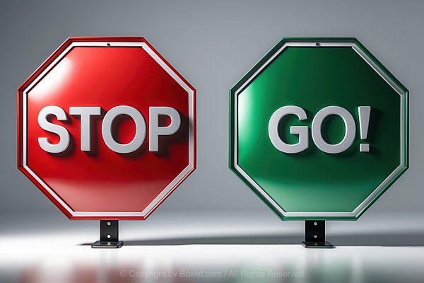 Two Metal Signs Of Red Stop And Green Go Side By Side