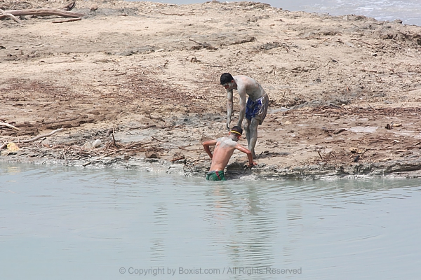 Mud Bath In The Dead Sea