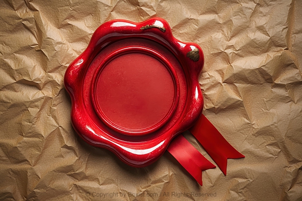 Red And Shiny Wax Seal On Old Crumpled Paper Vintage Parchment