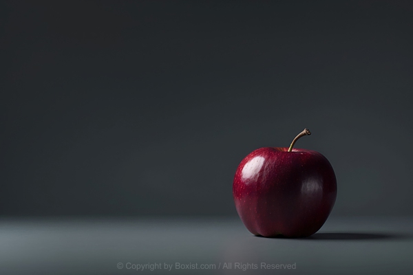 Single Red Apple On Black Background