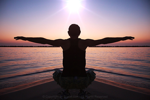 Man Open Armed at Sunset