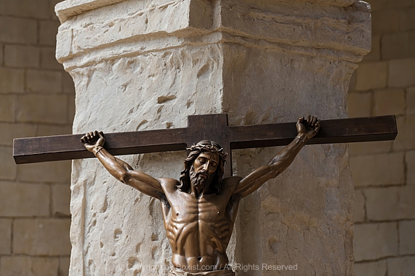 Sculpture Of Crucified Jesus On Wooden Cross