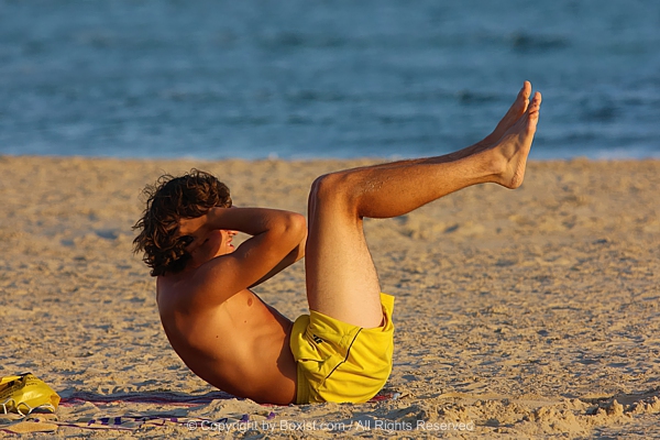 Seaside Workout With Man Exercising On Shoreline