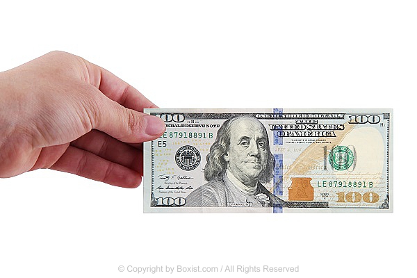 Hand Holding 100 Dollar Money Banknote