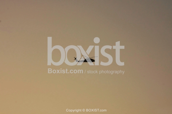 Helicopter Flying in Sky