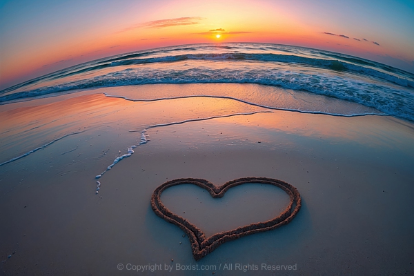 Heart Shape Drawn In Beach Sand At Serene Sunset