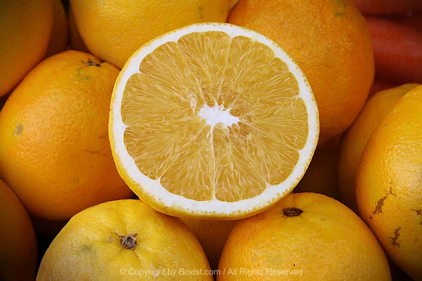 Fresh Oranges With One Cut In Half
