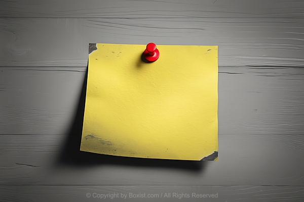 Yellow Grunge Paper Note Pinned To Gray Wooden Background