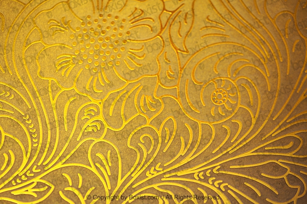 Embossed Golden Outline Patterns On Paper