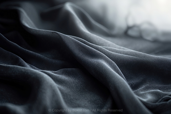 Closeup Of Flowing Black Satin Fabric