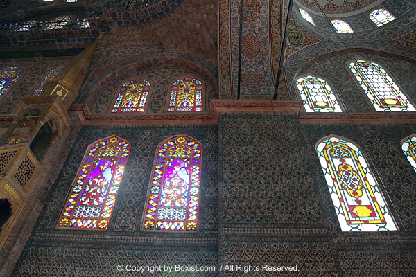 Stained Glass Windows And Ornate Ceramic On Walls Inside The Blue Mosque