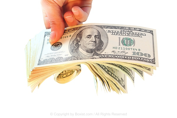 Hand Holding Thick Stack Of One Hundred Dollar Bills