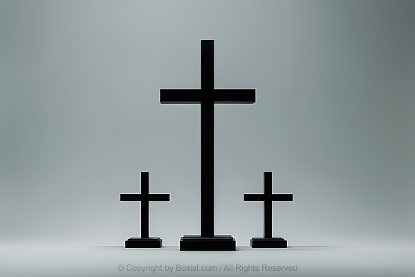 Three Black Crosses Against Gray Background