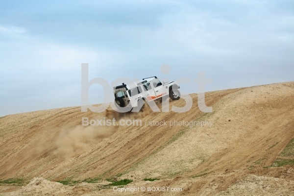 Driving 4WD Car Through Hill