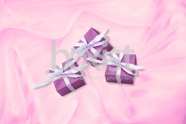 Gifts On Silk Background