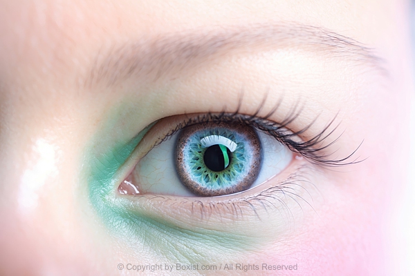 Macro Closeup Of Woman Eye With Light Blue Iris Featuring Intricate Patterns