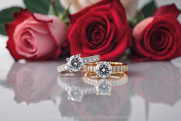 Two Rings Together And Red Roses