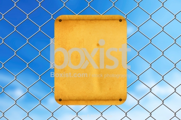 Fence with Rusty Blank Sign