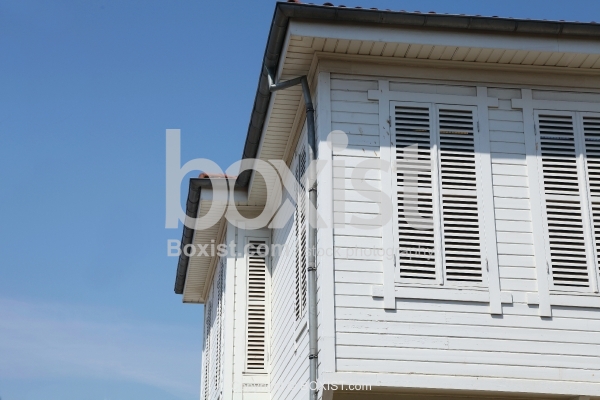 Side Windows Of Wooden House