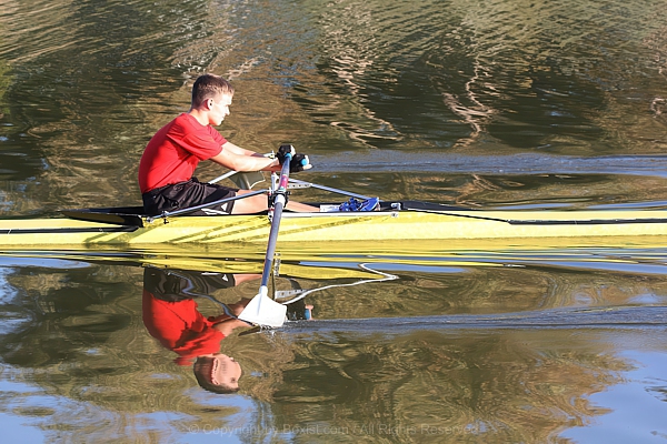 Young Boy Kayaking in Water