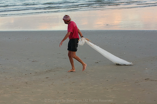 Fisherman Dragging His Net
