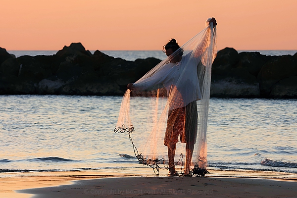 Fisherman Checking His Net
